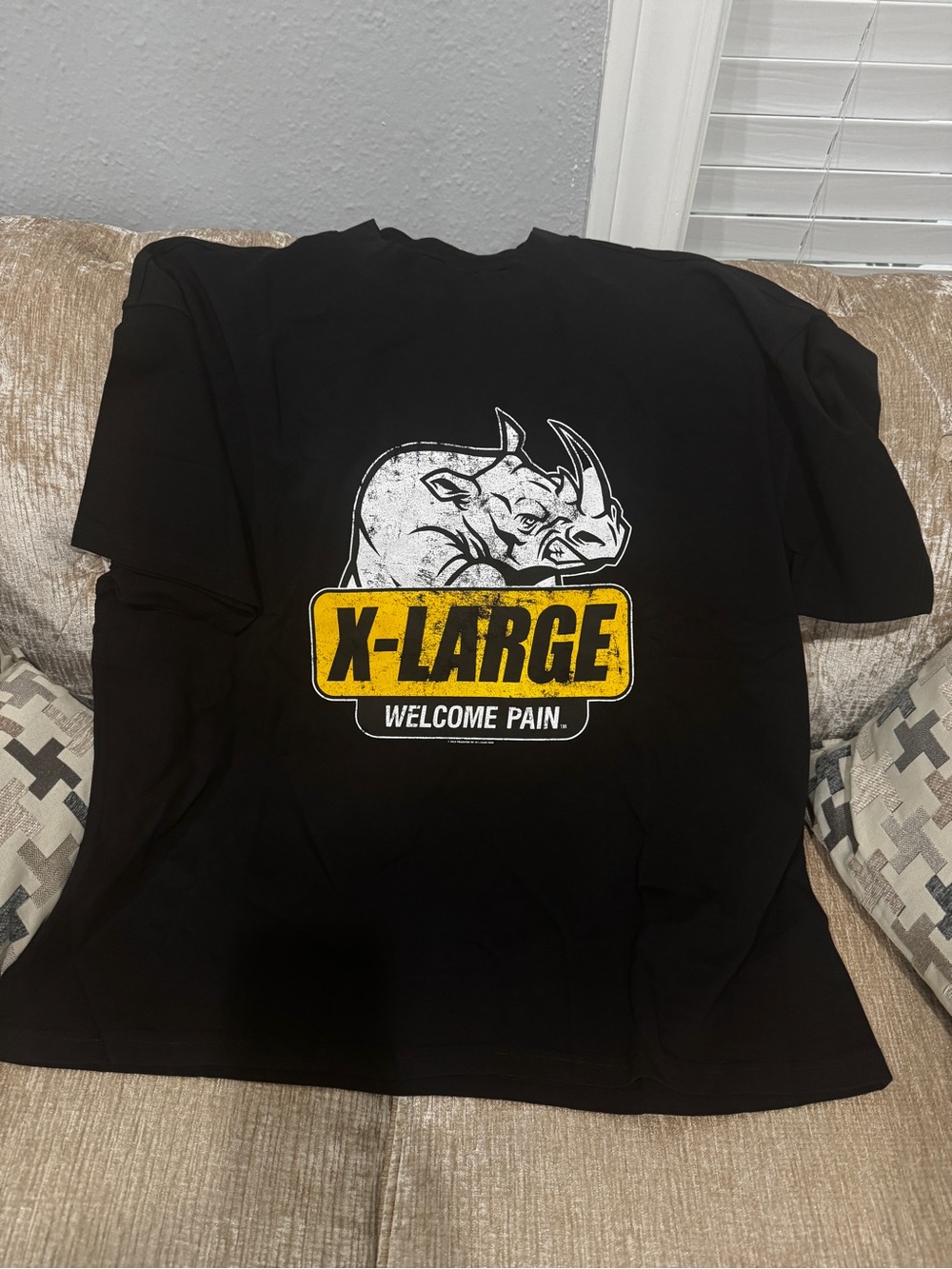 Welcome pain X-LARGE Black Graphic Tee with Rhino Logo men’s